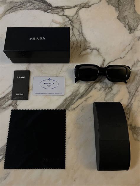 prada sunglasses authenticity card.